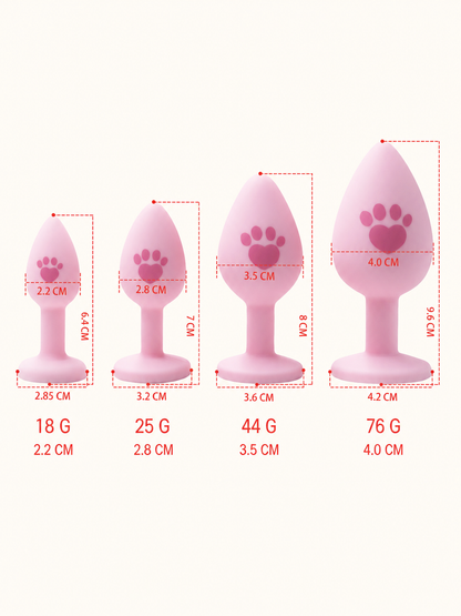 Pink paw-print silicone tail plug measurements for four sizes