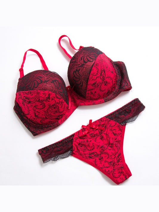 Paisley Noir Fuchsia Black plus size lace bra and thong set — flat lay