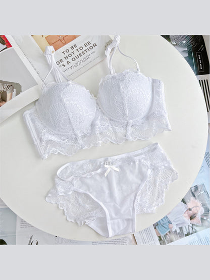Sculpted Lace Support white plus size bra and panty set — flat lay