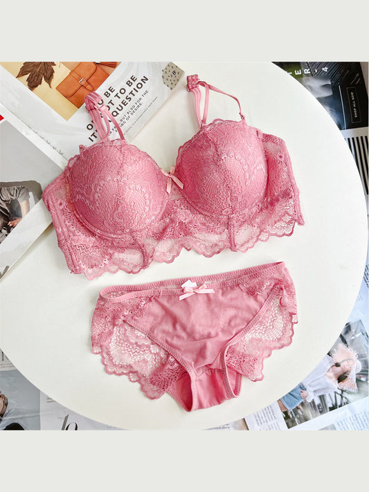 Sculpted Lace Support pink plus size bra and panty set — flat lay